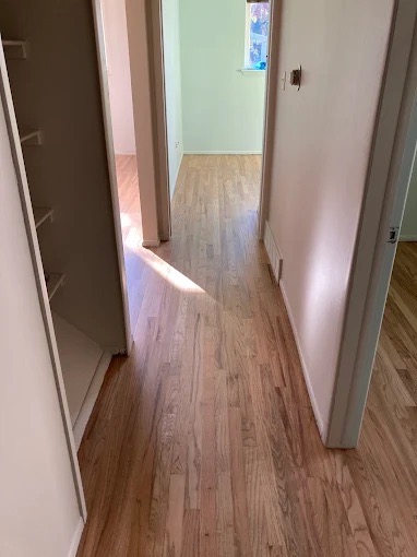 Finished hardwood floor with coordinated trim
